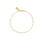 Gold bracelet with white beads for permanent jewelry or clasped pieces