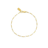 Gold bracelet with white beads for permanent jewelry or clasped pieces