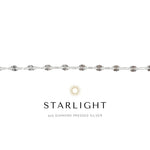 Silver bracelet with 'Starlight' branding on a white background