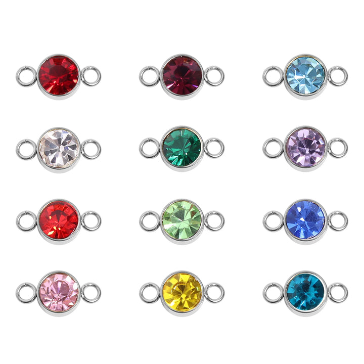 Set of colorful gemstone charms on a white background