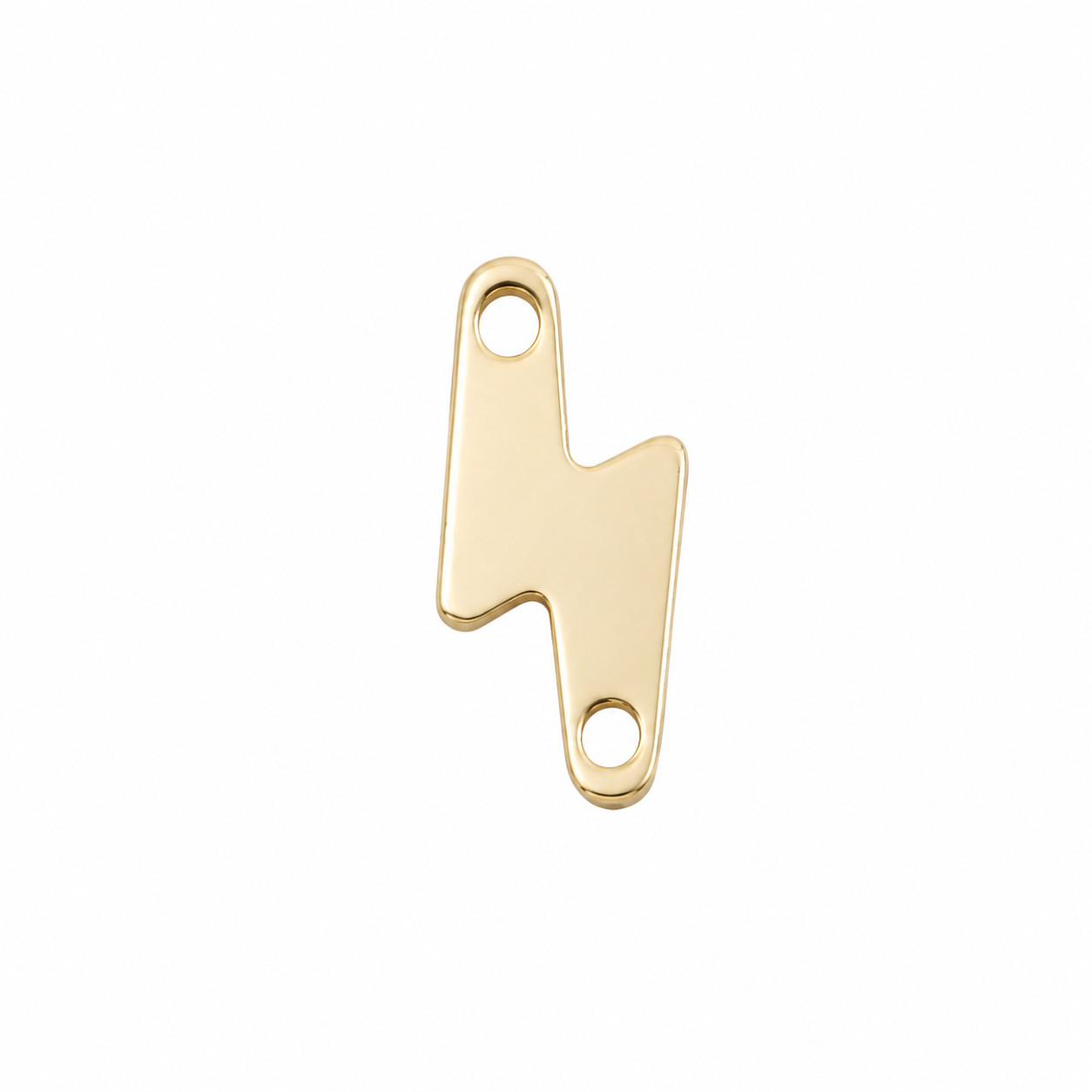 A polished gold lightning bolt charm with two circular holes, shown on a solid white background.
