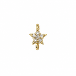 A small gold star-shaped jewelry charm with a cluster of clear stones in the center, shown on a plain white background.