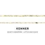 Two gold chains with 'Kenner' branding on a white background