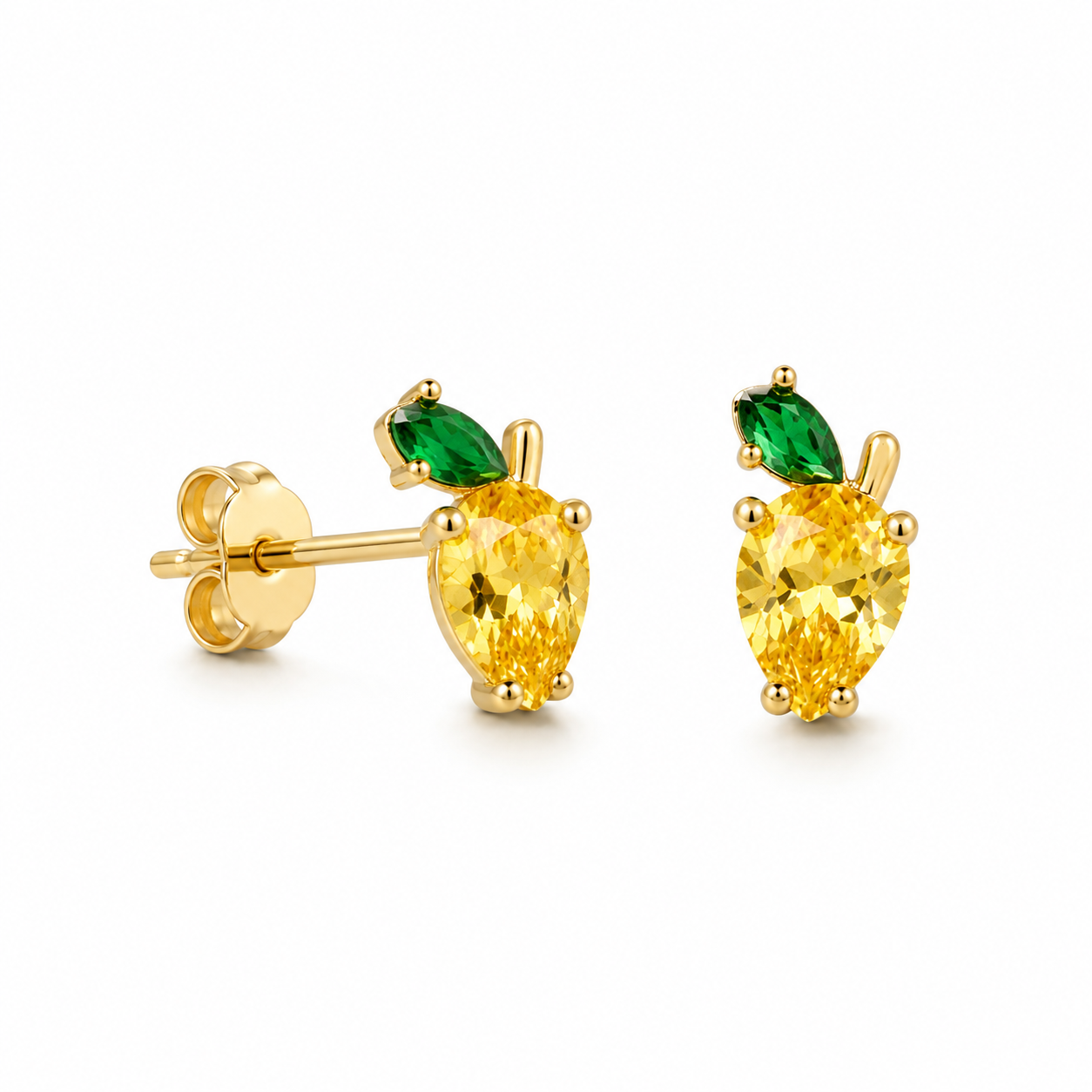 A pair of gold stud earrings featuring a pear-cut yellow gemstone and a marquise-cut green gemstone, shown on a clean white background.