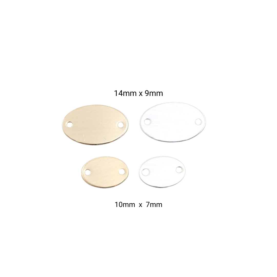 Two gold and two white circular metal tags with dimensions labeled on a white background