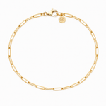 Gold bracelet with a Golden Bond marker charm on a white background