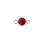 Jewelry component with a red gemstone and silver loops on a white background