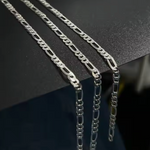 Silver Figaro Permanent Jewelry Chain on black