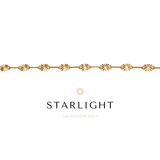 A gold bracelet with diamond-cut detailing, branded with 'Starlight'.